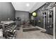 Well-equipped home gym with weights, treadmill, and fitness machines for convenient workouts at 532 Crown Mesa Ave, Las Vegas, NV 89138