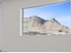 Window view showcasing the scenic mountain range and the neighborhood at 532 Crown Mesa Ave, Las Vegas, NV 89138
