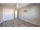 Bedroom featuring gray floors and a spacious closet at 6217 Red Jamboree Ct, Las Vegas, NV 89130
