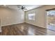 Bonus room with hardwood floors, neutral paint, and natural light at 6217 Red Jamboree Ct, Las Vegas, NV 89130