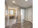 Upstairs hallway with wood-look floors and neutral paint at 6217 Red Jamboree Ct, Las Vegas, NV 89130