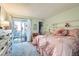 Bright bedroom with a private balcony, providing a relaxing retreat at 6883 Tamarus St # 203, Las Vegas, NV 89119