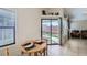 Inviting dining area featuring a sliding door with access to the backyard at 6982 Rusty Nail Way, Las Vegas, NV 89119