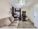 Office space featuring neutral carpet, sofa and dedicated desk area set up for work and productivity at 6982 Rusty Nail Way, Las Vegas, NV 89119