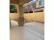 Backyard area featuring a concrete patio and block wall for privacy at 7439 S Pioneer Way, Las Vegas, NV 89113