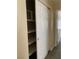 Hallway closet features organized shelving behind sliding doors at 7439 S Pioneer Way, Las Vegas, NV 89113