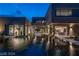 Exterior view of home showcasing a walkway over water connecting multiple buildings at 751 Wexler Ct, Las Vegas, NV 89107