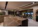 An entertaining area showcases a marble counter with recessed lights and a view to an outdoor zen garden at 751 Wexler Ct, Las Vegas, NV 89107