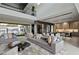 Spacious living room featuring high ceilings, an open layout, and access to the backyard at 751 Wexler Ct, Las Vegas, NV 89107