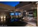 Stunning outdoor living area with a fire pit, pool and multiple flatscreen TV's at 751 Wexler Ct, Las Vegas, NV 89107