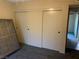 Bedroom featuring carpet flooring and closet with sliding doors at 774 Anne Ln, Henderson, NV 89015