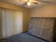 Bedroom featuring carpet flooring and natural light through sliding glass doors at 774 Anne Ln, Henderson, NV 89015