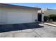 Charming home featuring a two-car garage and well-maintained landscaping with a touch of American pride at 774 Anne Ln, Henderson, NV 89015