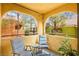 Cozy balcony with seating offers a relaxing outdoor space with neighborhood views at 7950 W Flamingo Rd # 2142, Las Vegas, NV 89147