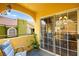 Cozy balcony with seating, views, sliding glass doors open to interior at 7950 W Flamingo Rd # 2142, Las Vegas, NV 89147