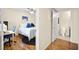Cozy bedroom with a bed, desk, and a door leading to a bathroom at 7950 W Flamingo Rd # 2142, Las Vegas, NV 89147