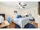 Comfortable bedroom with desk, ceiling fan, and mirrored closet providing lots of space at 7950 W Flamingo Rd # 2142, Las Vegas, NV 89147