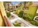 Exterior view of landscaped grounds with walkways and building at 7950 W Flamingo Rd # 2142, Las Vegas, NV 89147