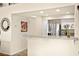 Kitchen pass-through with granite countertops, stainless steel appliances, and decorative mirror at 7950 W Flamingo Rd # 2142, Las Vegas, NV 89147