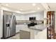 Stylish kitchen featuring stainless steel appliances, granite countertops, and white cabinetry at 7950 W Flamingo Rd # 2142, Las Vegas, NV 89147