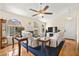 Spacious living room showcases a fireplace, hardwood floors, and comfortable couches at 7950 W Flamingo Rd # 2142, Las Vegas, NV 89147
