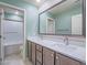 Bathroom features a double sink vanity and a tub with shower at 816 Stannard Ct, Henderson, NV 89052