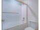 Bathroom showcases a tub-shower combo with white subway tile and glass doors at 816 Stannard Ct, Henderson, NV 89052
