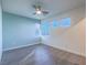 Bedroom features wood floors, a ceiling fan, and plenty of natural light at 816 Stannard Ct, Henderson, NV 89052