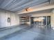 Spacious garage with epoxy floors, storage, and water heater at 816 Stannard Ct, Henderson, NV 89052
