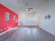 Spacious living area with hardwood floors, a ceiling fan, and bright, natural light at 816 Stannard Ct, Henderson, NV 89052