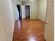Bright bedroom with wood floors, closet, and a window for natural light at 833 Aspen Peak Loop # 2613, Henderson, NV 89011