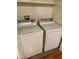 Convenient laundry area with full-size washer and dryer units, and tile floors at 833 Aspen Peak Loop # 2613, Henderson, NV 89011