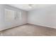 Inviting bedroom featuring neutral walls, carpet, and window with blinds at 8600 W Charleston Blvd # 1043, Las Vegas, NV 89117