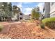 Well-maintained courtyard with decorative rock and lush landscaping at 8600 W Charleston Blvd # 1043, Las Vegas, NV 89117
