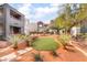 Inviting courtyard area featuring artificial turf and stone pathway at 8600 W Charleston Blvd # 1043, Las Vegas, NV 89117