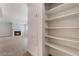 View of the living room fireplace and built-in shelving for extra storage at 8600 W Charleston Blvd # 1043, Las Vegas, NV 89117