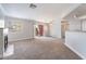Cozy living room with fireplace, ceiling fan, and sliding door to balcony at 8600 W Charleston Blvd # 1043, Las Vegas, NV 89117