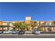 Apartment complex features covered parking, mature trees, and well-maintained landscaping at 8777 W Maule Ave # 3090, Las Vegas, NV 89148