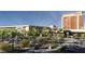 New commercial property with ample parking and landscaped grounds under a sunny sky at 8777 W Maule Ave # 3090, Las Vegas, NV 89148