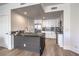 Bright, modern kitchen featuring stainless steel appliances, a stylish island, and ample cabinet space at 8777 W Maule Ave # 3090, Las Vegas, NV 89148