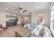 Bright open concept living space flowing from living room into the dining area and kitchen at 8777 W Maule Ave # 3090, Las Vegas, NV 89148