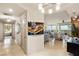 Inviting hallway featuring elegant artwork and opening to a spacious living area at 9101 Alta Dr # 307, Las Vegas, NV 89145