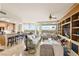 Spacious living room with large windows, comfortable seating, and built in shelves and entertainment center at 9101 Alta Dr # 307, Las Vegas, NV 89145