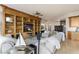 Well-appointed living room with comfortable seating, custom built-ins, and great natural light at 9101 Alta Dr # 307, Las Vegas, NV 89145