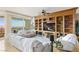 Comfortable living room with built-in shelving and entertainment center with great natural light at 9101 Alta Dr # 307, Las Vegas, NV 89145