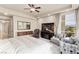 Spacious main bedroom with ample natural light, a seating area, and views, creating a relaxing retreat at 9101 Alta Dr # 307, Las Vegas, NV 89145