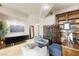 Well-lit office space featuring a custom desk and chair, plus ample storage at 9101 Alta Dr # 307, Las Vegas, NV 89145
