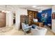 Stylish office space with custom shelving, comfortable seating, and elegant decor at 9101 Alta Dr # 307, Las Vegas, NV 89145