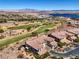 Luxury home with a beautiful view of the golf course, lake, and mountains at 10 Via Visione # 103, Henderson, NV 89011