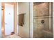 Updated shower with tile surround and glass door at 10 Via Visione # 103, Henderson, NV 89011